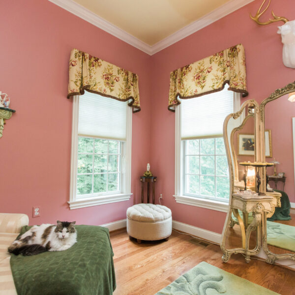 pink bedroom with shades