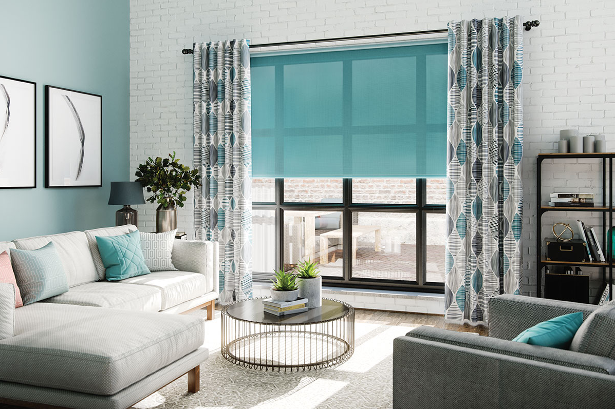living room with teal window shade and window treatment