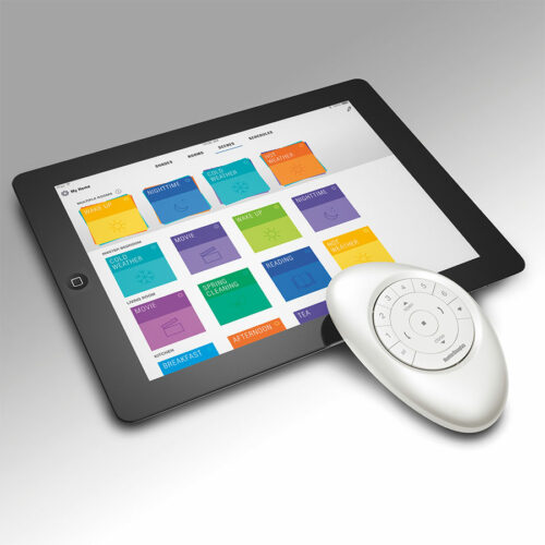 Tablet displaying a smart home app with a circular remote control for motorized shades