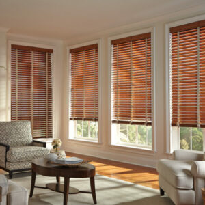 Window blinds covering home windows while filtering natural light